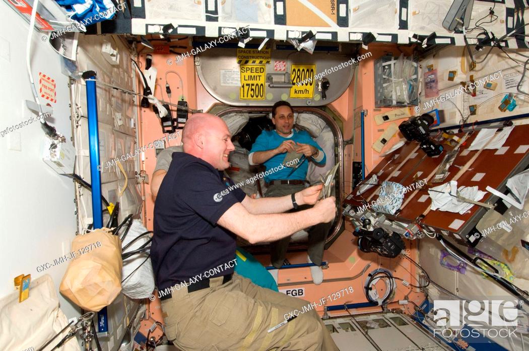 Stock Photo: European Space Agency astronaut Andre Kuipers (foreground), Expedition 31 flight engineer, and Russian cosmonaut Anton Shkaplerov, Expedition 30 flight engineer.