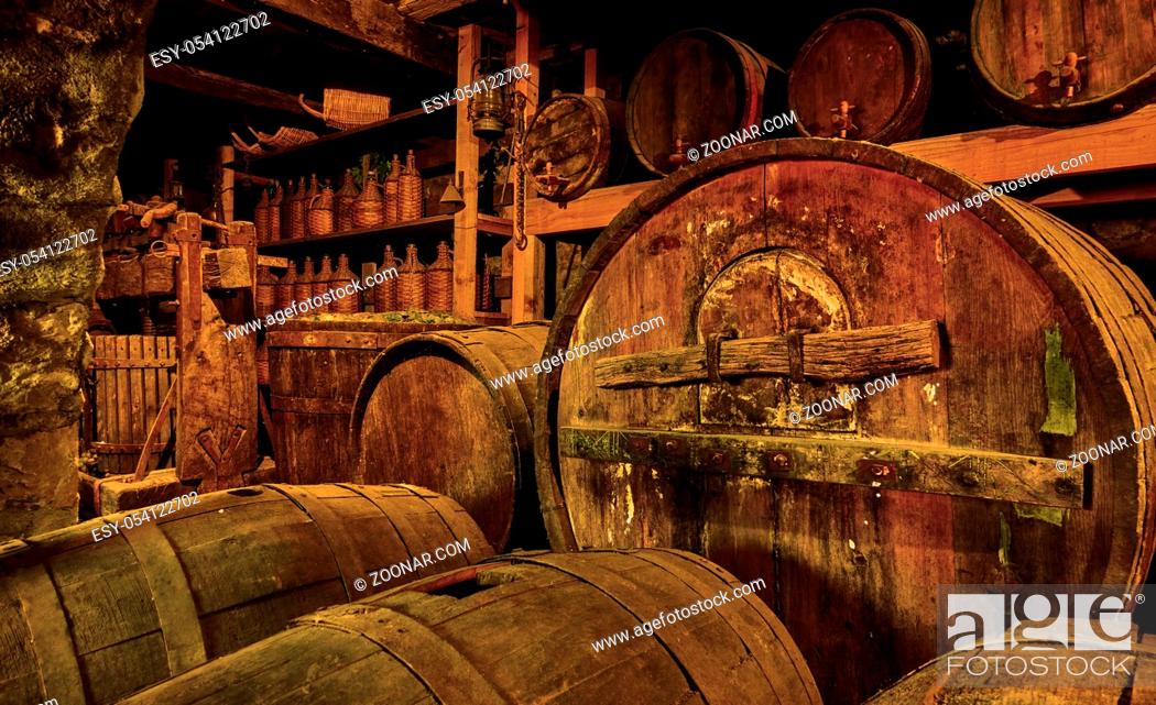 Stock Photo: Wine barrels and casks in old cellar.