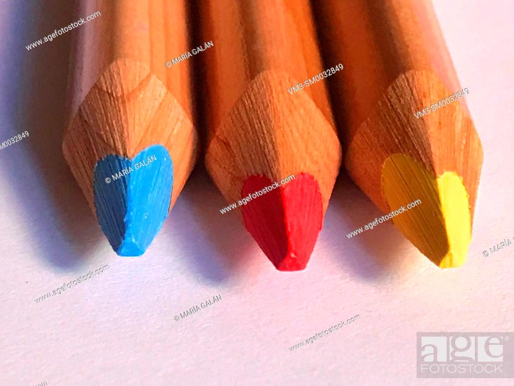 Stock Photo: Three color pencils: yellow, magenta and cyan.