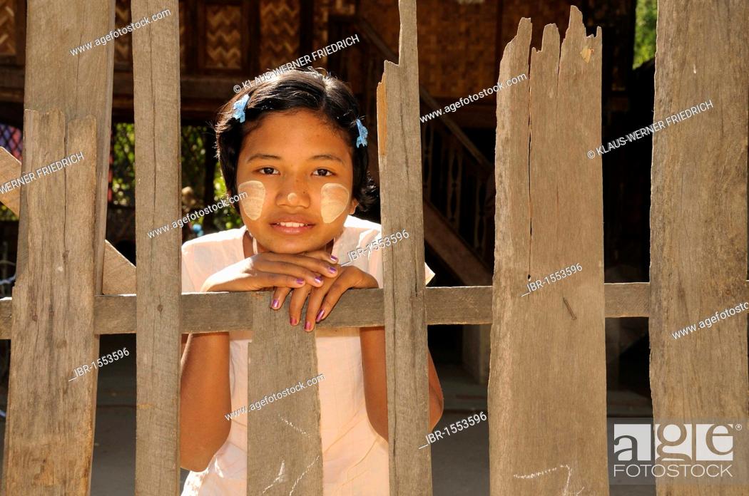 Stock Photo: Girl with thanaka paste on her face, Burmese make-up, a village near Bagan, Myanmar, Burma, Southeast Asia, Asia.