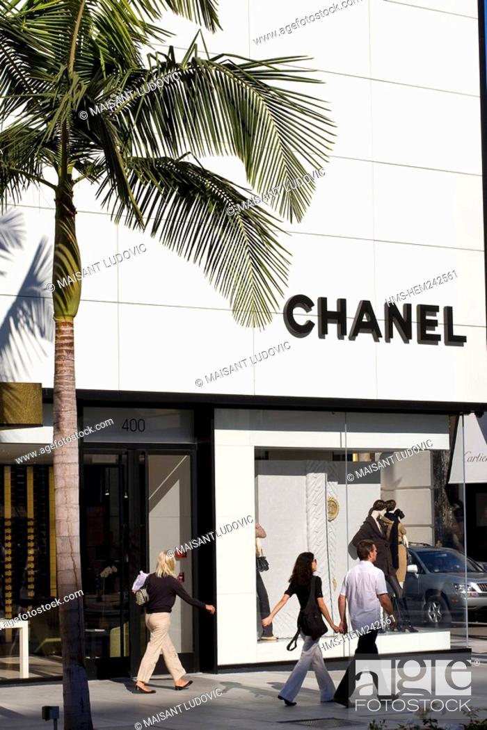 United States, California, Los Angeles, Beverly Hills, Rodeo Drive, couple  in front of Chanel store, Stock Photo, Picture And Rights Managed Image.  Pic. HMS-HEM242561