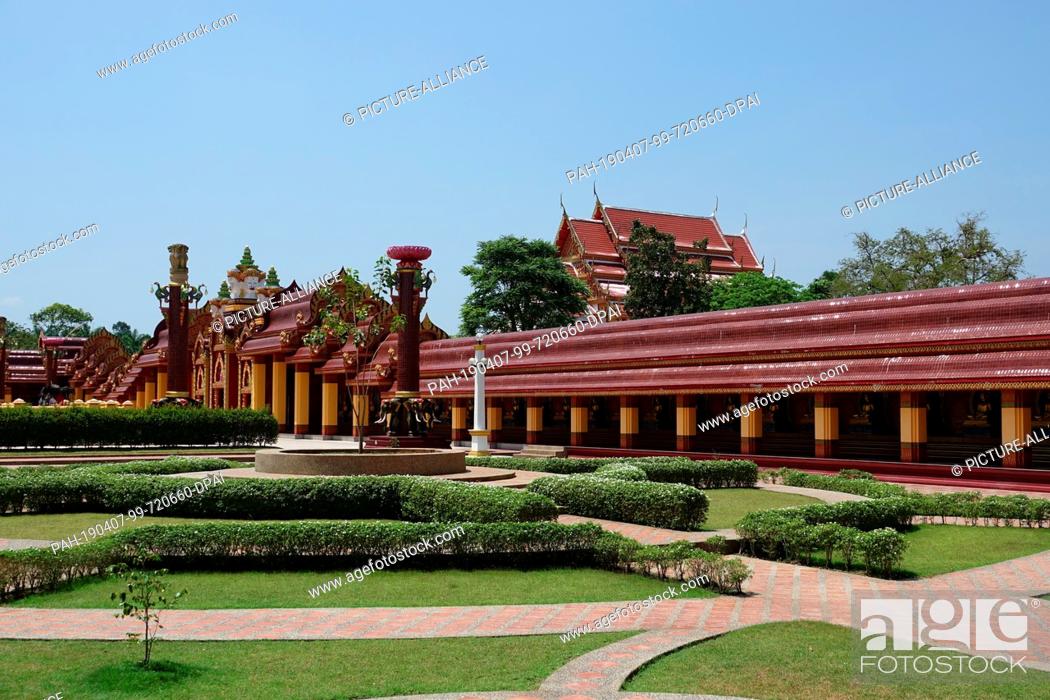 Stock Photo: 04 March 2019, Thailand, Ao Luek Distrikt: The estate and a lobby with pagodas in Wat Maha That Wachira Mongkol or also called Wat Bang Tong.