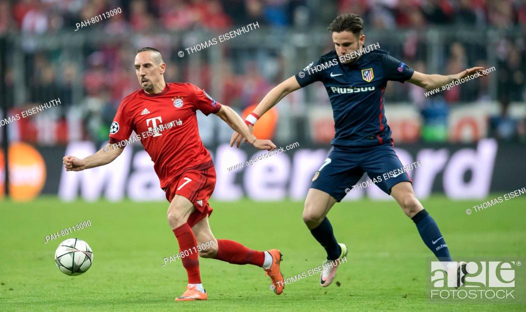 Stock Photo: Bayern Munich's Franck Ribery (l) and Madrid's Saul in action during the UEFA Champions League semi final soccer match FC Bayern Munich vs Atletico Madrid in.