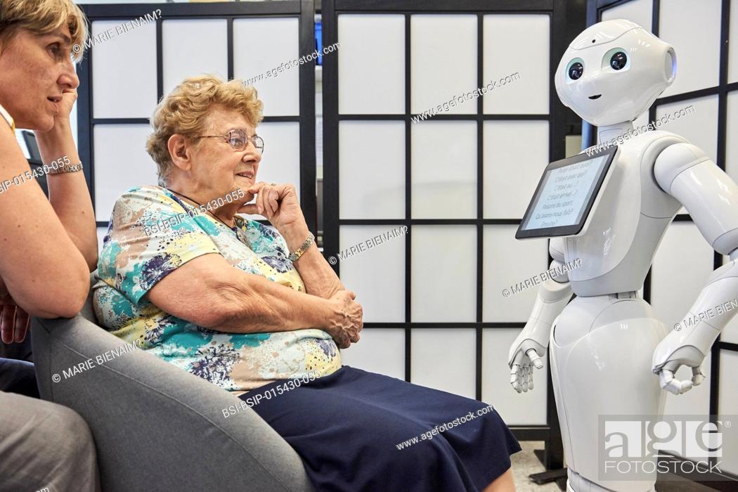Stock Photo: Reportage in the U1208 Lab at Inserm, which studies cognitive sciences and robot-human communication. The team works with two robots.