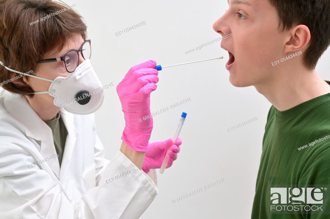 Stock Photo: Doctor Collecting with a nasopharyngeal nose and throat swab.