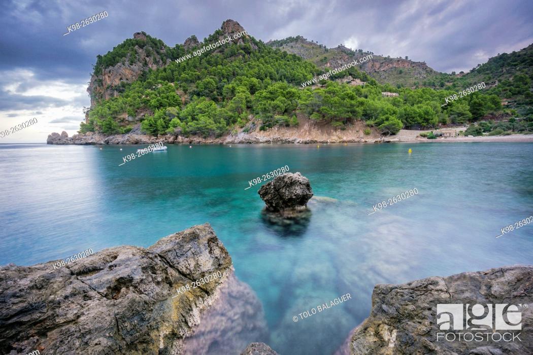 Stock Photo: Spain, Balearic Islands, Majorca, Serra de Tramuntana, Escorca, Cala Tuent, Scenic landscape with sea and rocks.