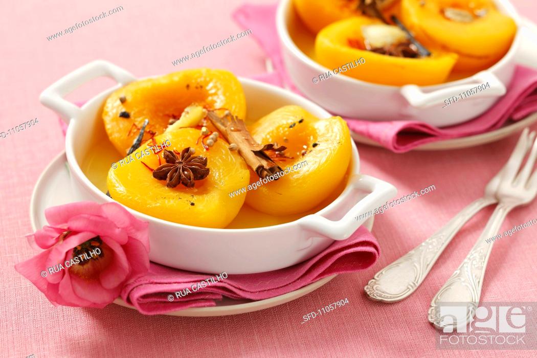 Stock Photo: Baked peaches with honey and spices.