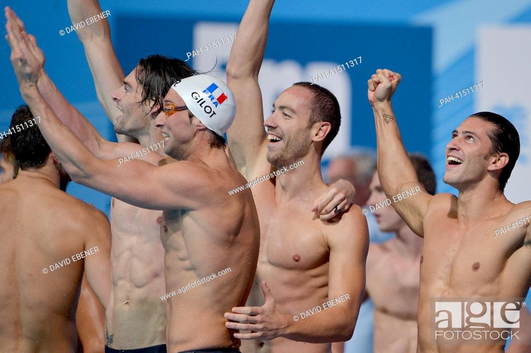 Stock Photo: Camille Lacourt (2-L), Jeremy Stravius (2-R) Giacomo Perez D'ortona (R) and Fabien Gilot (3-L) of France celebrate after winning the men's 4x100m Medley relay.